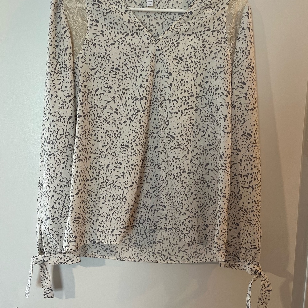 White and Black Patterned Blouse